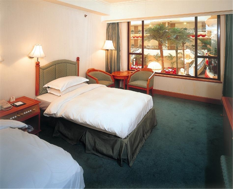 Guangzhou Hotel Pequim Quarto foto